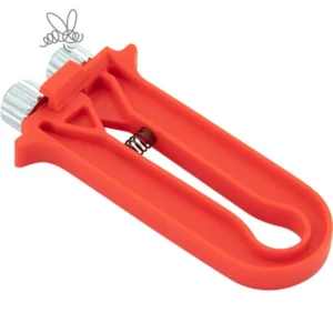 Röd trådspännare i plast med metallhjul för uppspänning av ramtråd.