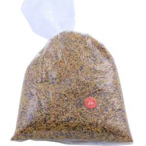 Klar plastpåse med 1 kg torkat bipollen i gulbruna kulörer, importerat från EU.