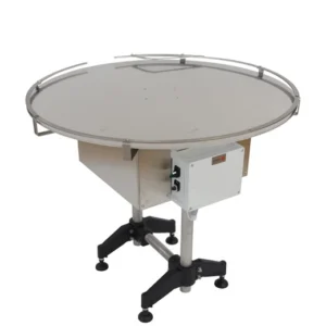 Rundbord i rostfritt stål med elanslutning, avsett för uppsamling av fyllda glasburkar vid tappning.